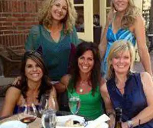 customers posing for a group photo