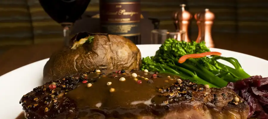 Steak with peppercorn sauce