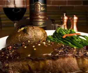 Steak with peppercorn sauce